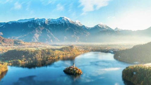 Beautiful image of a foggy lake and mountainside